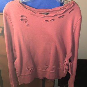 Loose fitting distressed sweater